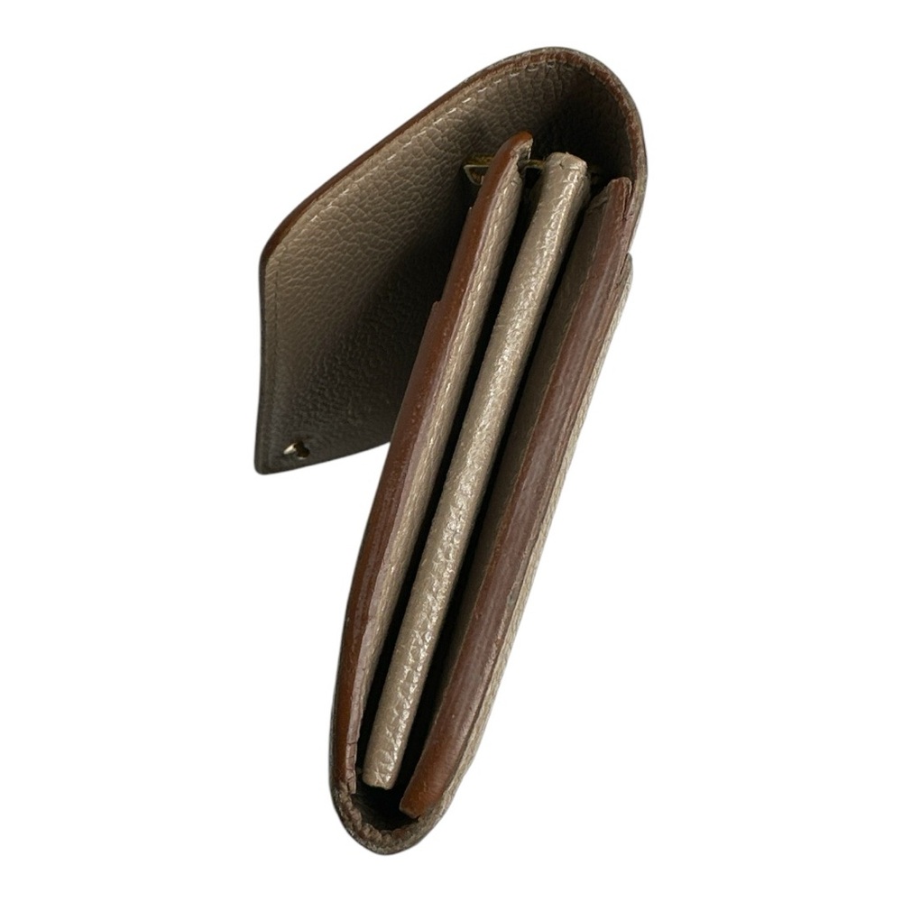 Louis Vuitton Monogram Empreinte Leather Sarah Wallet in Neutral - Picture 9 of 15